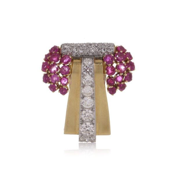 Diamond and ruby brooch in platinum and gold.