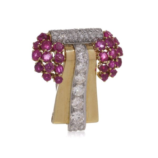 Diamond and ruby brooch in platinum and gold.