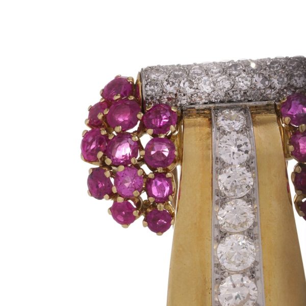 Diamond and ruby brooch in platinum and gold.