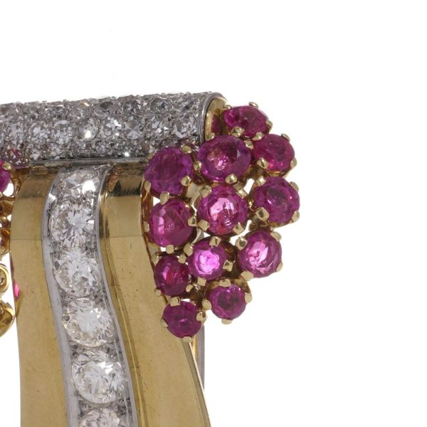 Diamond and ruby brooch in platinum and gold.