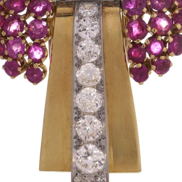 Diamond and ruby brooch in platinum and gold.