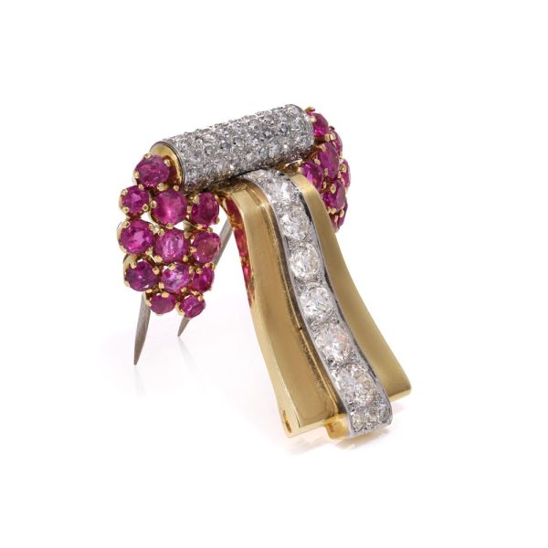 Diamond and ruby brooch in platinum and gold.