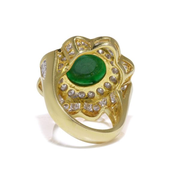 Jade and diamond cluster ring in gold.