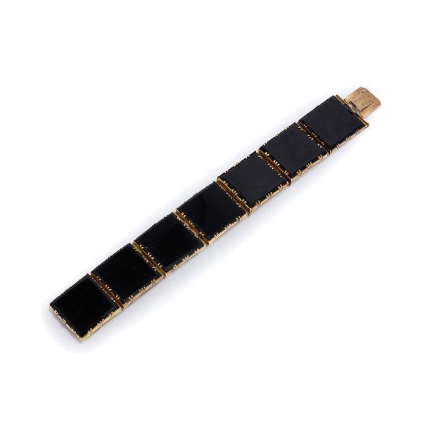 Gold and onyx memorial plaque link bracelet.