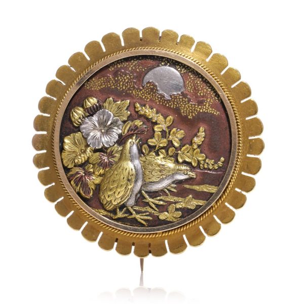 Antique Japanese brooch in gold and silver.