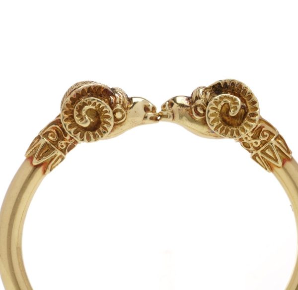 David Thomas head bangle in gold.