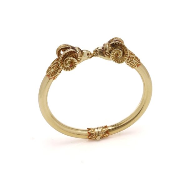 David Thomas head bangle in gold.