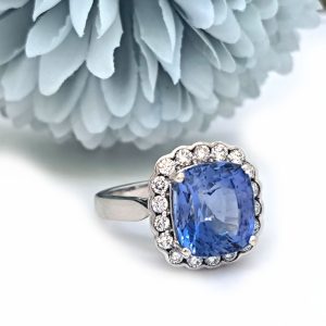 Natural Unheated Ceylon 7.79 carats Blue sapphire and Diamond Cluster Ring