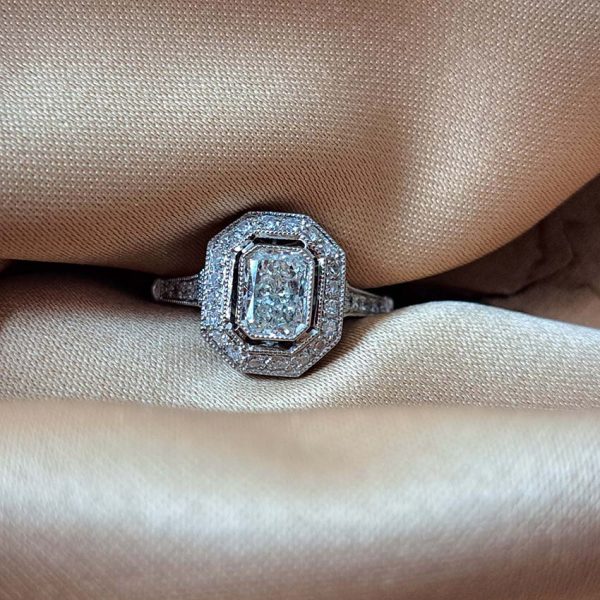 0.85ct Emerald Cut Diamond Halo Cluster Engagement Ring in Platinum