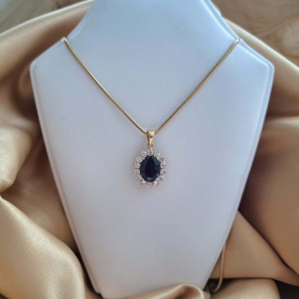 Vintage 3ct Sapphire and Diamond Oval Cluster Pendant with Chain, 3ct oval-cut blue sapphire surrounded by 1.40 carats sparkling diamonds on 18ct yellow gold snake chain