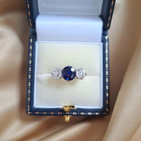 Art Deco 1.71ct Sapphire and 1.60ct Old Cut Diamond Three Stone Engagement Ring in Platinum, Circa 1920