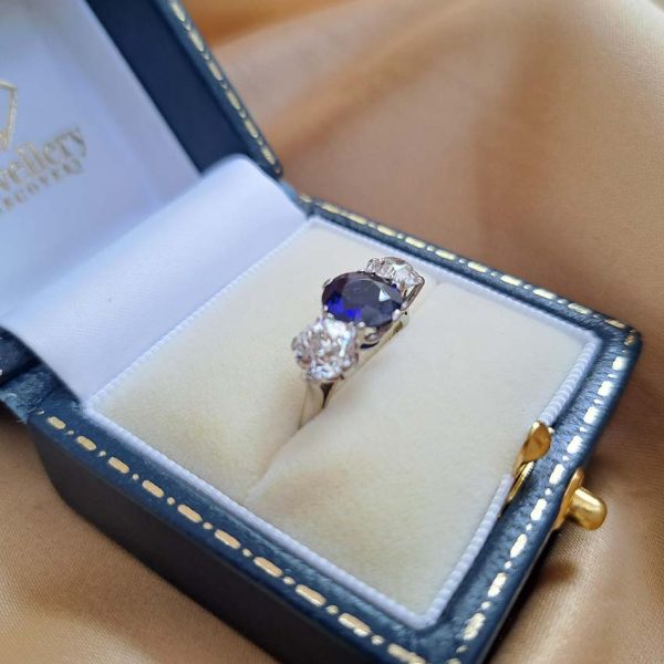 Art Deco 1.71ct Natural Sapphire and 1.60ct Old Cut Diamond Three Stone Engagement Ring in Platinum, Circa 1920