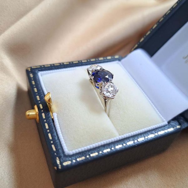 Art Deco 1.71ct Sapphire and 1.60ct Old Cut Diamond Three Stone Engagement Ring in Platinum, Circa 1920