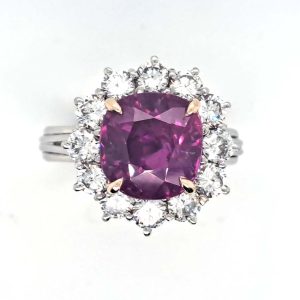 Certified Natural No Heat Ceylon Pink Sapphire Cluster Ring, 5.07ct cushion-shaped vivid pink sapphire with purple undertones surrounded by 1.80cts sparkling diamonds in platinum