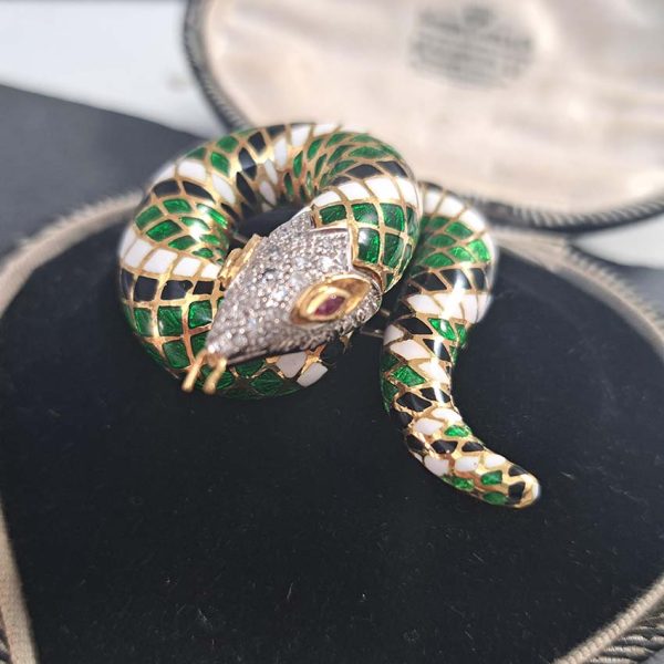 Green White and Black Enamel Gold Snake Brooch, 18ct yellow gold coiled snake brooch decorated with black, white and green enamel in intricate scale design