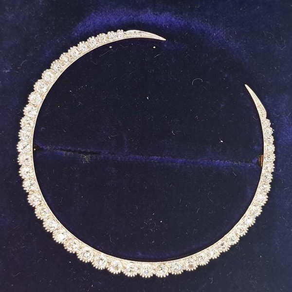 Antique Old Mine Cut Diamond Crescent Moon Brooch set with graduating old mine-cut diamonds in platinum and 14ct gold