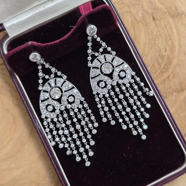 Vintage Late Art Deco 6.93ct Diamond and Platinum Chandelier Fringe Drop Earrings, with 6.93 carats of brilliant-cut, Edwardian-cut and old-cut diamonds, Circa 1935