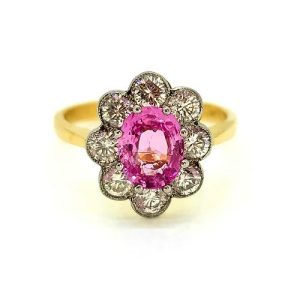 1.50ct Pink Sapphire and Diamond Floral Cluster Engagement Ring, oval pink sapphire surrounded by 1ct sparkling diamonds in timeless flower cluster design in 18ct yellow gold