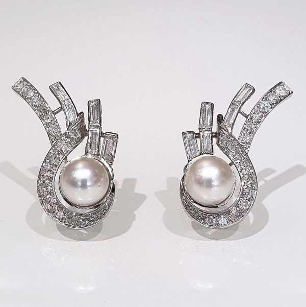 Vintage 1940s Retro Pearl and Diamond Earrings inspired by Art Deco design with 1.40 carats of eight-cut, single-cut and baguette-cut diamonds in platinum