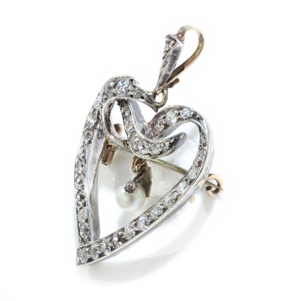 Heart brooch/pendant with old cut diamonds in gold and silver.