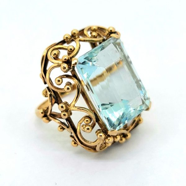 15ct Emerald Cut Aquamarine Solitaire Statement Cocktail Ring, large 15 carat emerald-cut aquamarine nestled within a handmade yellow gold scrolled mount