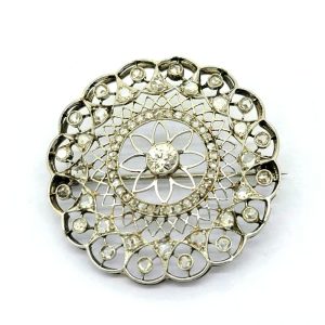 Belle Epoque Diamond Set Platinum Brooch, stunning openwork circular brooch crafted in platinum and studded with sparkling diamonds