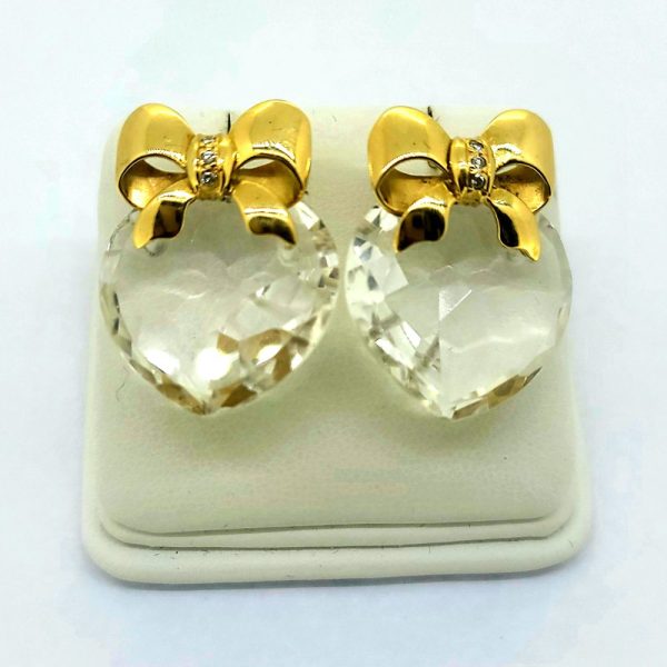 Kiki McClaugh Crystal Heart and Gold Bow Earrings, Carved heart shaped crystal drop earrings topped with yellow gold bows accented with diamonds