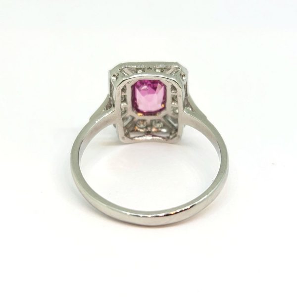 1ct Pink Sapphire and Diamond Cluster Dress Ring in Platinum, emerald-cut pink sapphire within brilliant-cut diamond surround accented with baguette-cut diamond to each corner