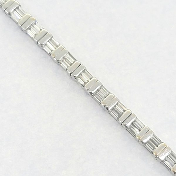 Vintage 4.50ct Baguette Cut Diamond Line Tennis Bracelet, 37 links each set with two baguette-cut diamonds in 18ct White Gold