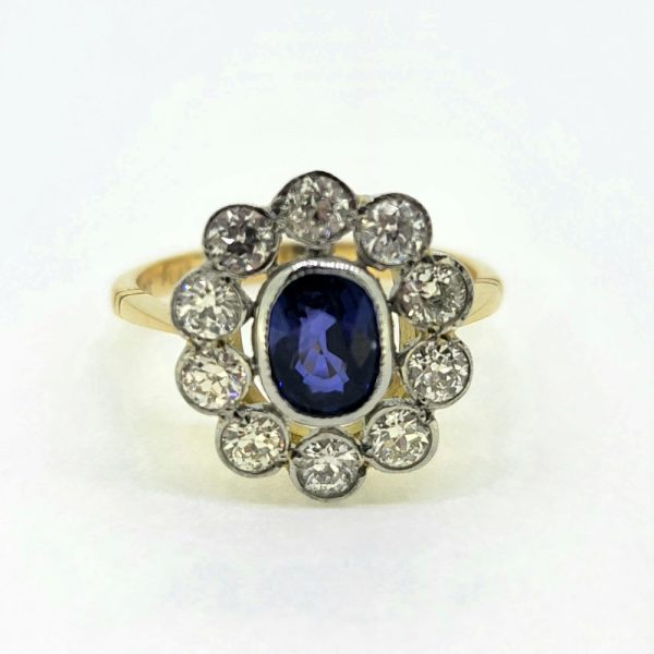 1.35ct Oval Sapphire and Diamond Floral Cluster Ring in Platinum and 18ct Yellow Gold