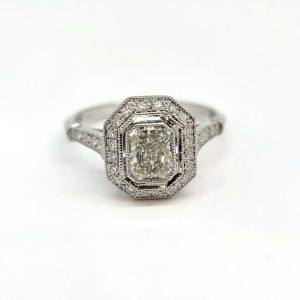 Emerald Cut Diamond Halo Cluster Engagement Ring in Platinum