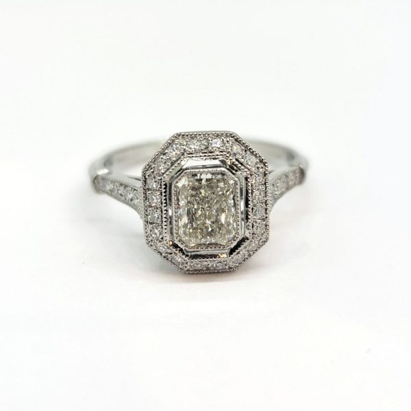 0.85ct Emerald Cut Diamond Halo Cluster Engagement Ring in Platinum