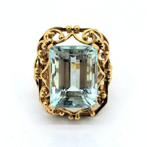 15ct Emerald Cut Aquamarine Solitaire Statement Cocktail Ring, large 15 carat emerald-cut aquamarine nestled within a handmade yellow gold scrolled mount