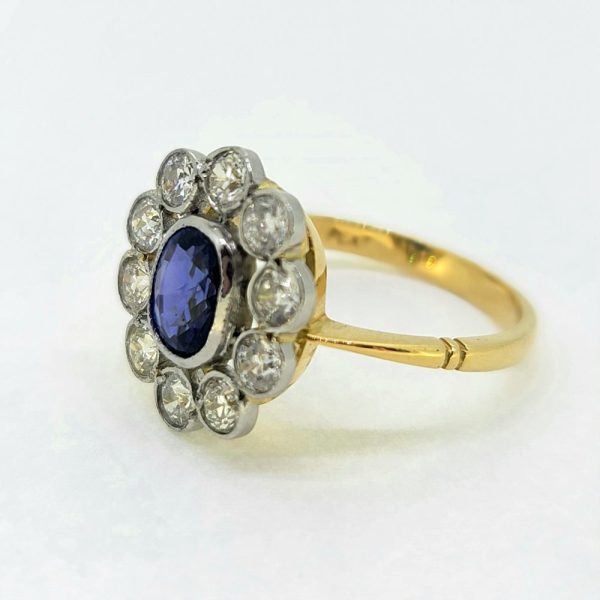 1.35ct Oval Sapphire and Diamond Floral Cluster Ring in Platinum and 18ct Yellow Gold