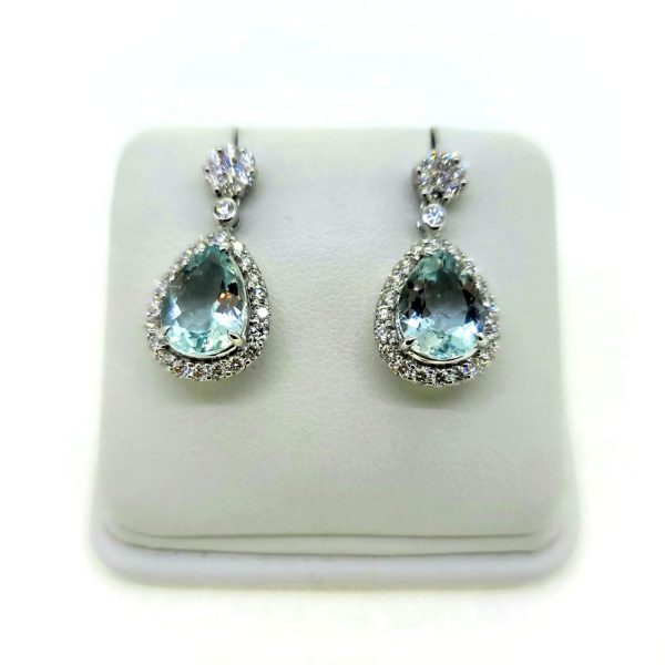 4.30ct Pear Cut Aquamarine and Diamond Cluster Drop Earrings, pear-cut aquamarines nestle within diamond halo surrounds suspended from diamond set tops in 18ct white gold