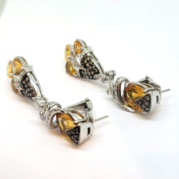 Citrine and Diamond Drop Earrings, oval citrine tops lead to drops with three citrines, all accented with sparkling diamonds