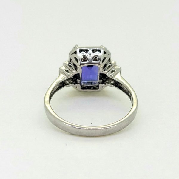 2ct Emerald Cut Tanzanite and Diamond Cluster Engagement Ring in Platinum with Baguette Diamond Shoulders