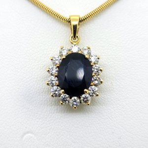 Vintage 3ct Sapphire and Diamond Oval Cluster Pendant with Chain, 3ct oval-cut blue sapphire surrounded by 1.40 carats sparkling diamonds on 18ct yellow gold snake chain