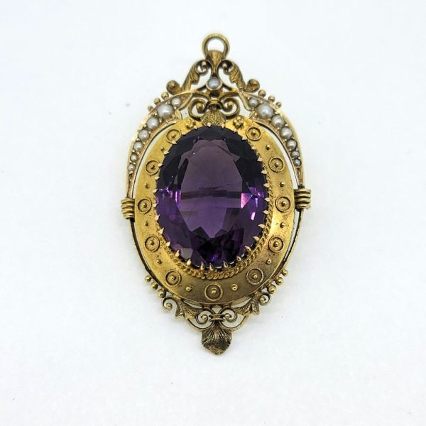 Victorian Antique Amethyst and 15ct Gold Etruscan Brooch with detailed pearl top edge, Secured by a single pin