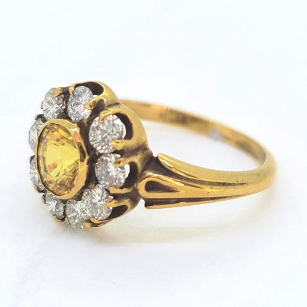 Antique Style 1.20ct Yellow Sapphire and Diamond Cluster Engagement Ring, 1.20ct round yellow sapphire surrounded by 0.90cts diamonds in 18ct yellow gold