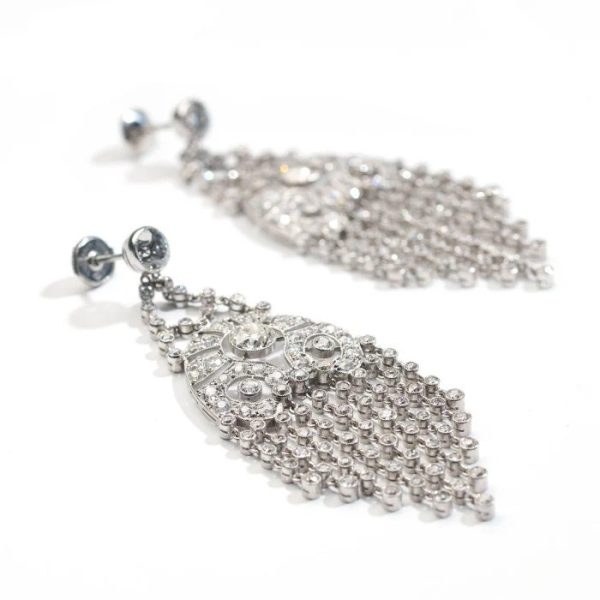 Vintage Late Art Deco 6.93ct Diamond and Platinum Chandelier Fringe Drop Earrings, with 6.93 carats of brilliant-cut, Edwardian-cut and old-cut diamonds, Circa 1935