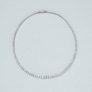 9ct Diamond Line Tennis Necklace in Platinum, 9 carats of round brilliant-cut diamonds set in individual bezel settings which gradually increase in size to the middle