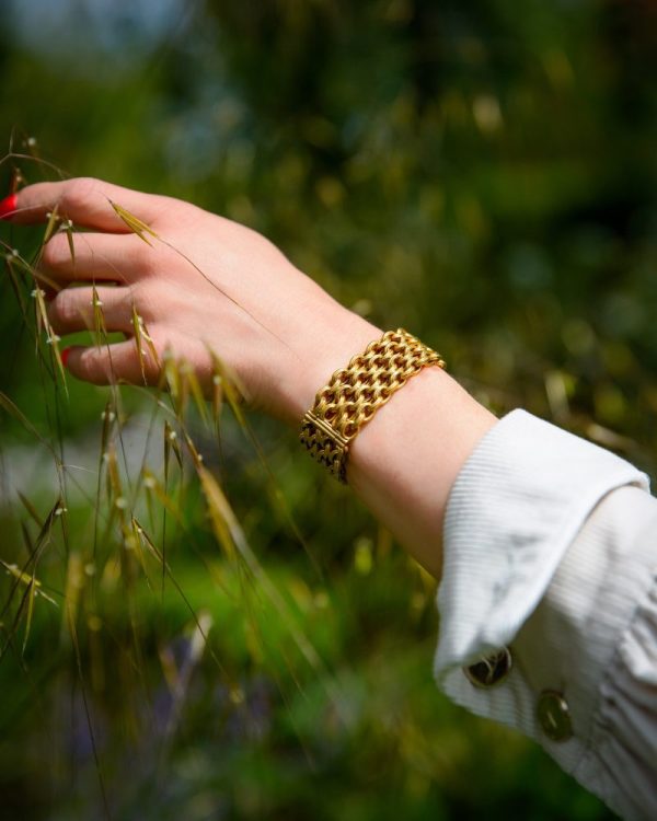 Four row rope chain bracelet in 22 carat yellow gold.