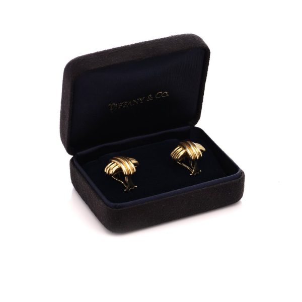 Tiffany & Co. X motif clip-on earrings in gold.