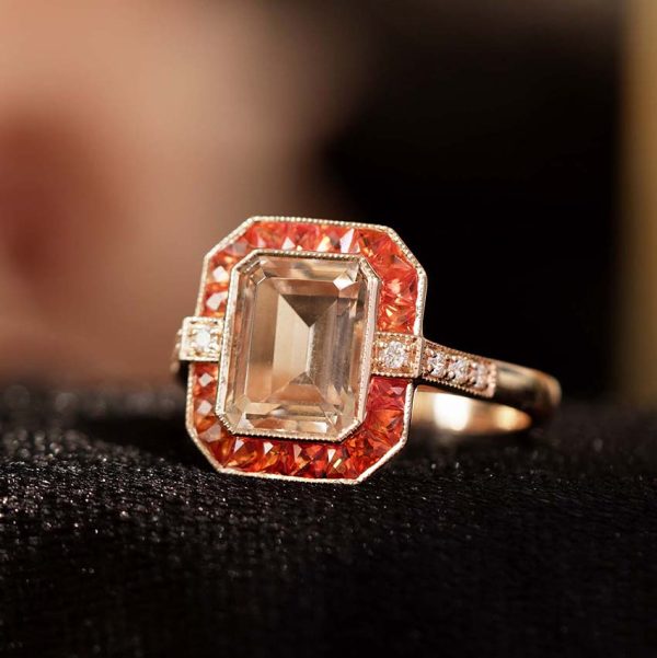 2.25ct Emerald Cut Morganite and Orange Sapphire Cluster Engagement Ring with Diamond Shoulders in Rose Gold