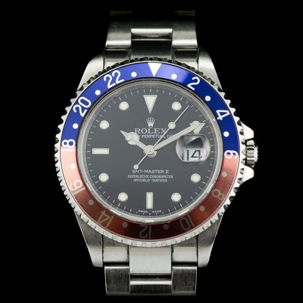 Rolex GMT Master II Pepsi Bezel 16710 Watch in original Rolex box along with its original GMT instruction booklet and stamped punched papers from 2006