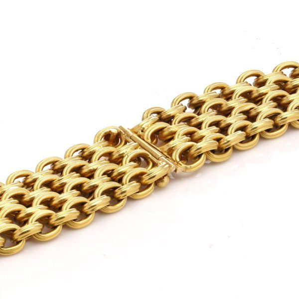 Four row rope chain bracelet in 22 carat yellow gold.