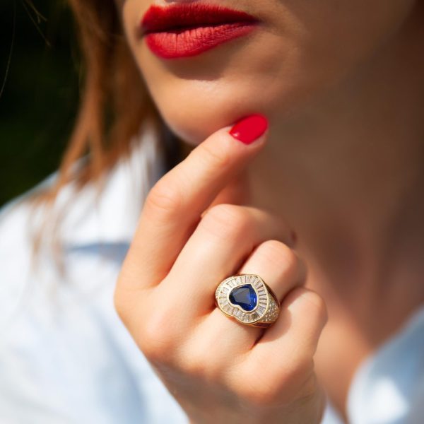 Sapphires, ruby and diamond ring in white gold.