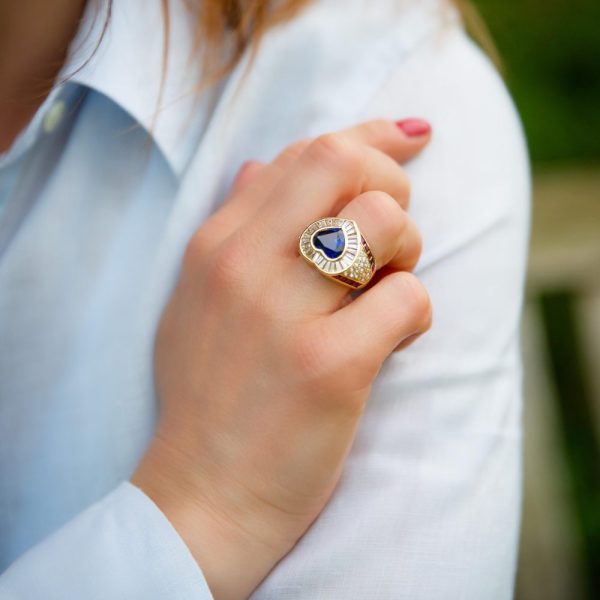 Sapphires, ruby and diamond ring in white gold.