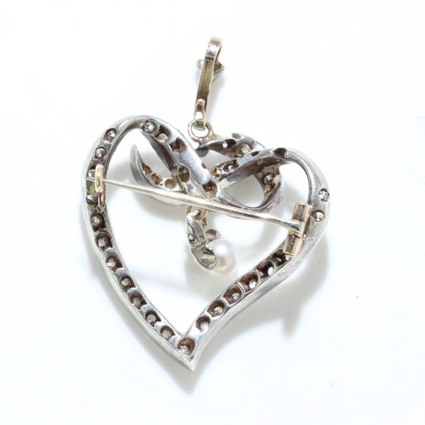 Heart brooch/pendant with old cut diamonds in gold and silver.